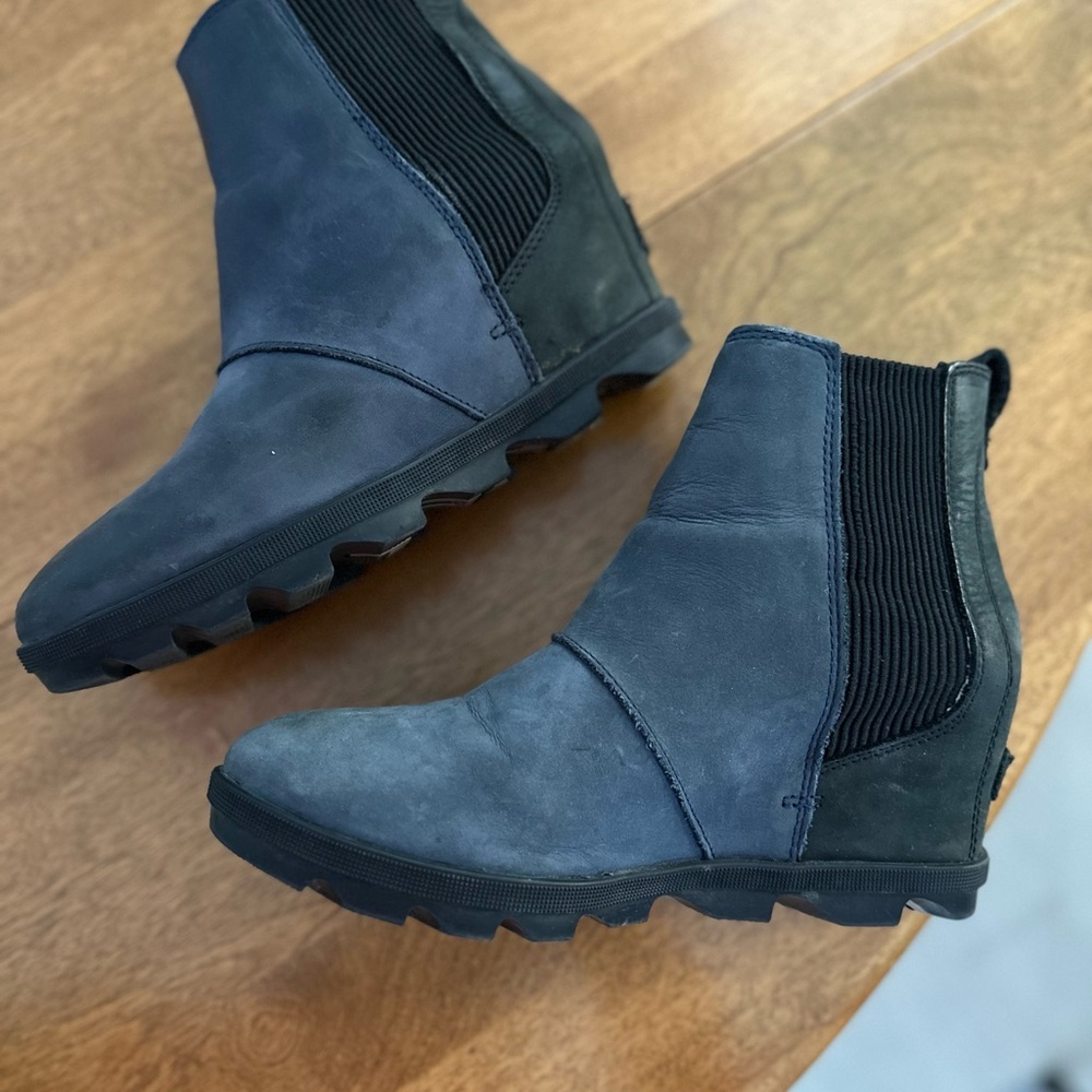Sorel waterproof leather booties. Wedge heel, great traction, super comfortable.